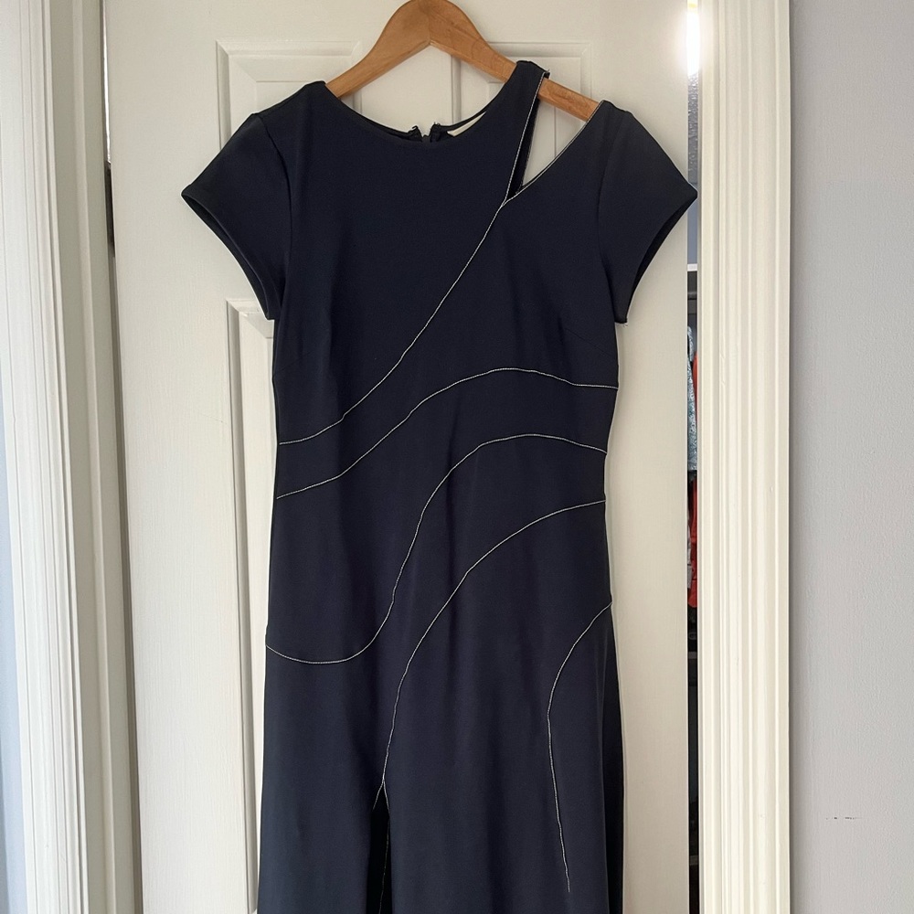 Navy Eshatki dress made by Zapelle with stitching.